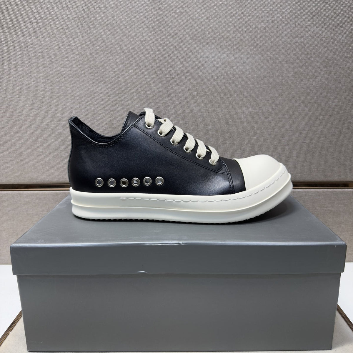 Black and Off-White Low-Top Sneakers